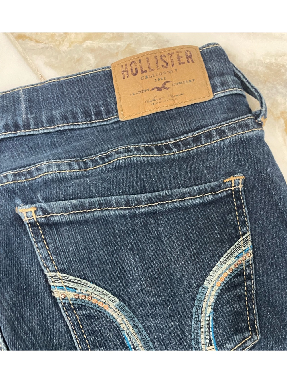 Hollister Dark Blue Skinny Jeans with Light Blue and Gold Stitching